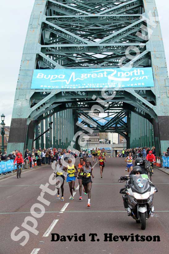 Mike Kigen leads the 2012 BUPA GNR as they head for the Tyne Bridge.